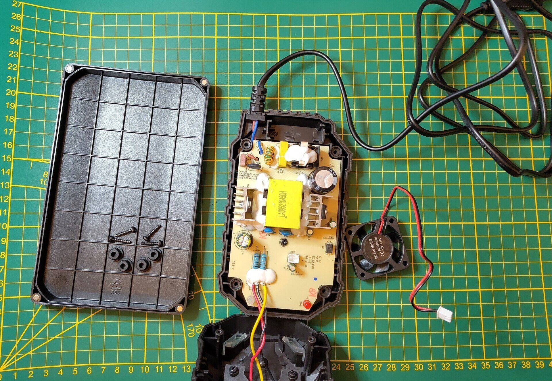 Shows the Parkside 20V Charger opened with the stock fan removed